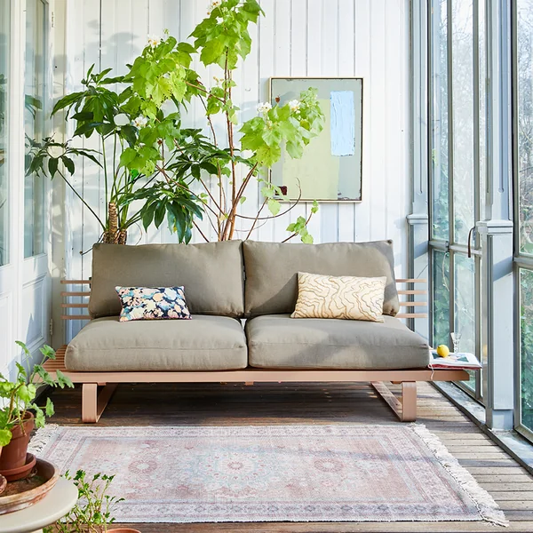 The weatherproof aluminum outdoor lounge sofa from HKliving in the bright living room