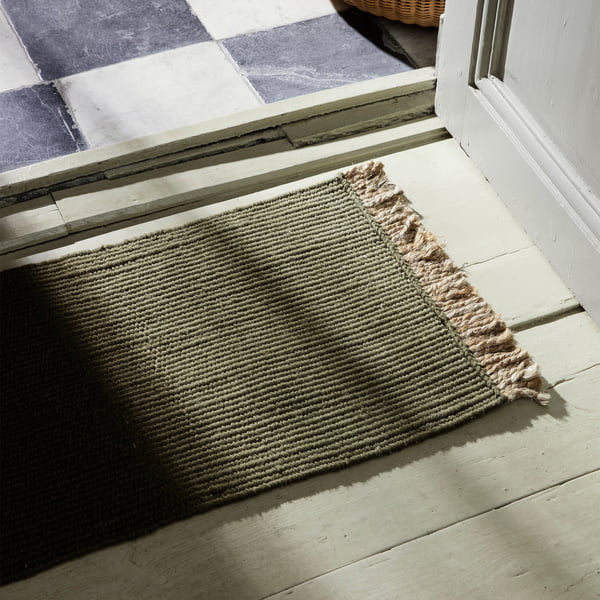 Block doormat from ferm Living in the color olive green
