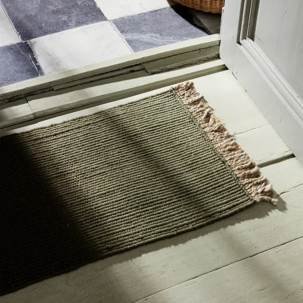 Block doormat from Ferm Living in the color olive green