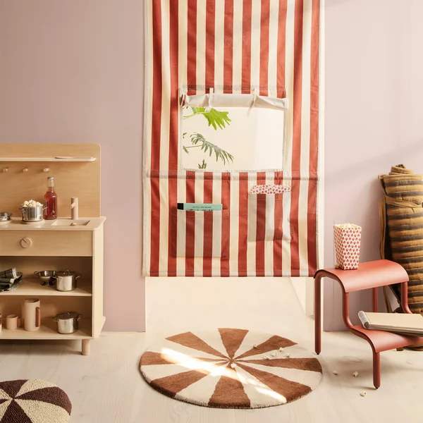 Arch Tufted carpet from Ferm Living in the brick red / off-white version